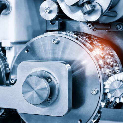 Close up of an industrial biscuit and candy making machine